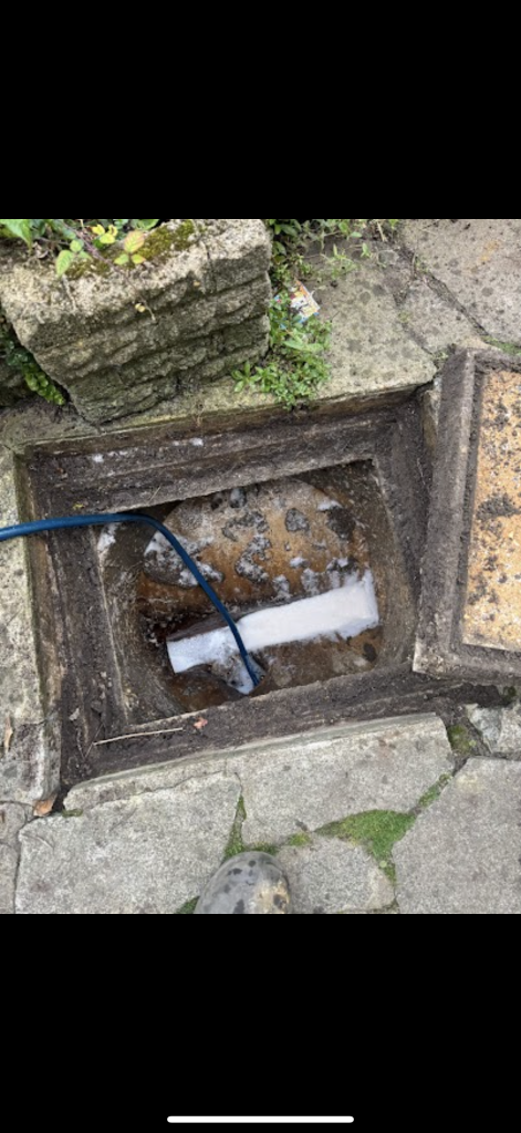 Jetting hose and foamy water inside a Milton Keynes drainage chamber
