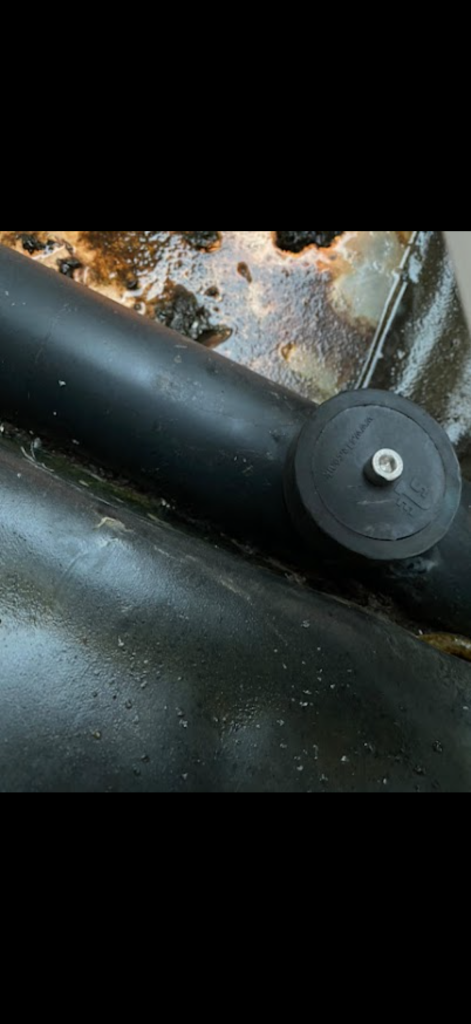 Capped access point on black drainage pipework in Stevenage